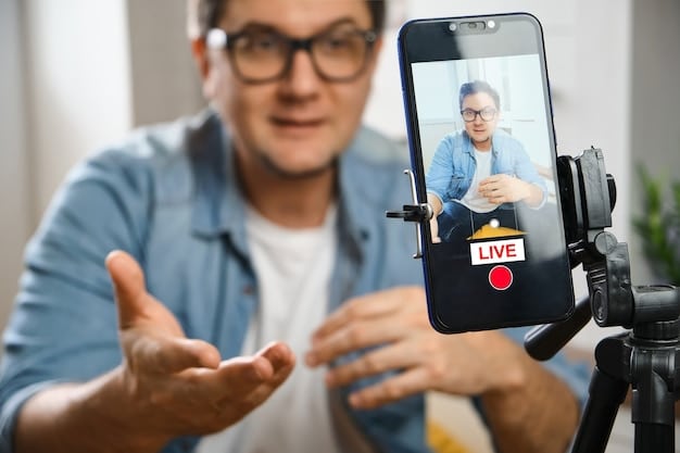 A creator live streaming on YouTube, interacting with viewers in real-time through the chat feature, illustrating the connectivity and interactive potential of social media platforms.