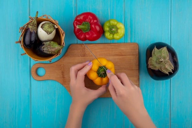 A close-up shot of a person's hands preparing a colorful and nutritious plant-based meal in a bright kitchen, with various ingredients like fresh vegetables, herbs, and spices visible.
