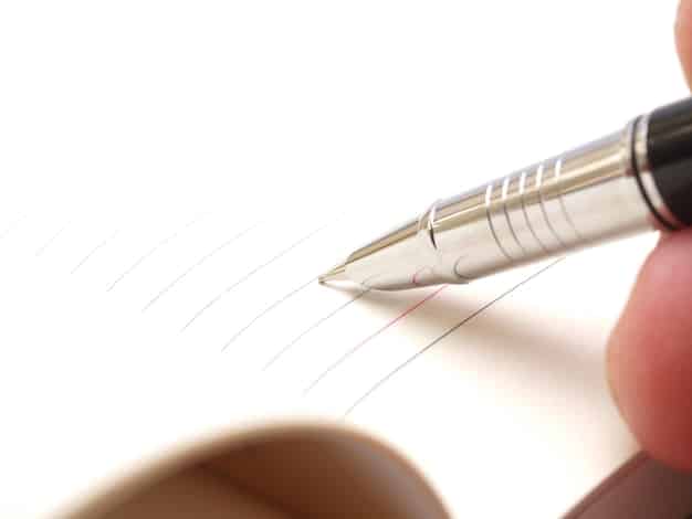 A close-up shot of a pen signing a document with the SBA logo in the background, but the person's expression is concerned. Overlay a graph showing a rising line representing interest rates.