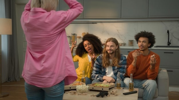 A group of friends is joyfully gathered in a living room, each holding a different video game controller, intensely focused on a large TV screen displaying a popular multiplayer game. Empty snack bowls are scattered around them, indicating a long session of shared enjoyment.