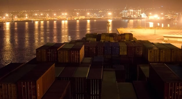 A complex network of global shipping containers and agricultural products being loaded onto ships at a busy port, with a blurry background of extreme weather, symbolizing supply chain disruptions.
