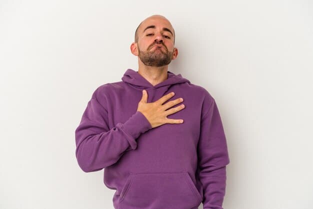 A close-up, impactful image of a person struggling to breathe, perhaps holding their chest or using an inhaler, against a slightly blurred background of a smoggy city street, conveying the health struggle.
