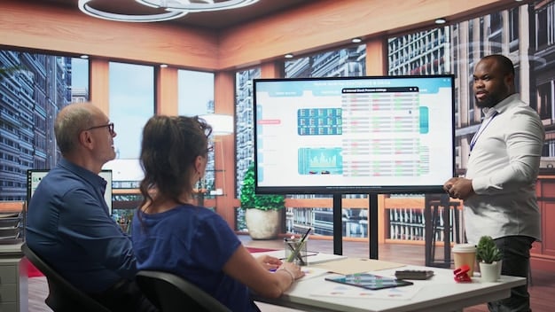 Engineers analyzing complex cloud infrastructure diagrams displayed on multiple screens in a modern, well-lit office.