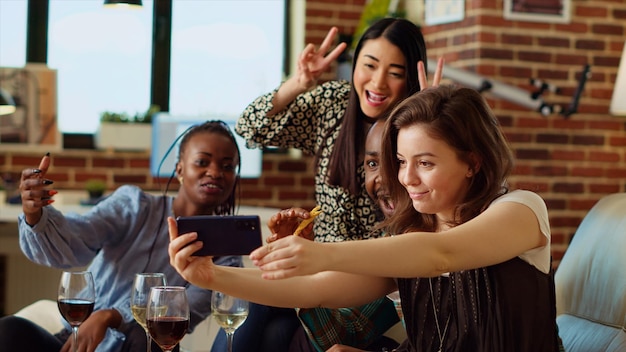 A diverse group of young adults, looking engaged and happy while scrolling through TikTok on their phones, with musical notes and TikTok logos subtly overlayed, indicating active music discovery and content consumption.
