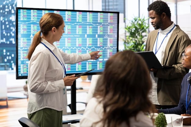 A diverse group of business professionals in a modern office looking at data visualizations on a large screen, which show declining carbon emissions and rising green investments, symbolizing strategic realignment.