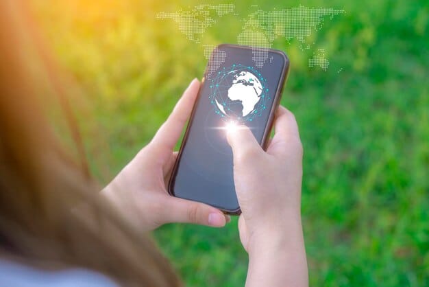 A person's hands holding a smartphone, displaying an environmental advocacy app with real-time pollution data on a map, symbolizing tech-driven activism.
