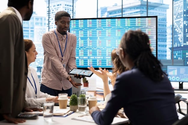 A diverse group of business professionals in a modern office looking at data visualizations on a large screen, discussing financial reports. One person is pointing at a chart showing fluctuating interest rates.