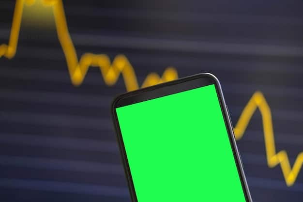 A detailed, close-up shot of a smartphone screen displaying a stock market app with green and red trading graphs, alongside a professional pointing at real-time financial data on a desktop monitor in a modern office setup.